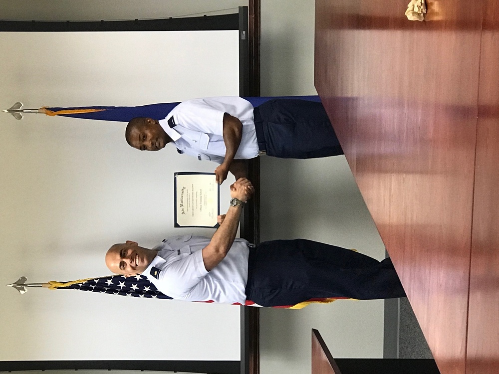 Lt. Ellison Receives his Diploma