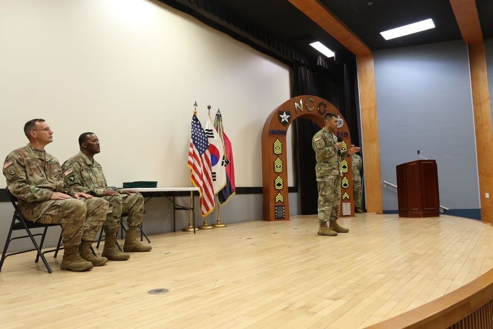 Guest speaker Sgt. Maj. Gabriel Camacho addresses graduates