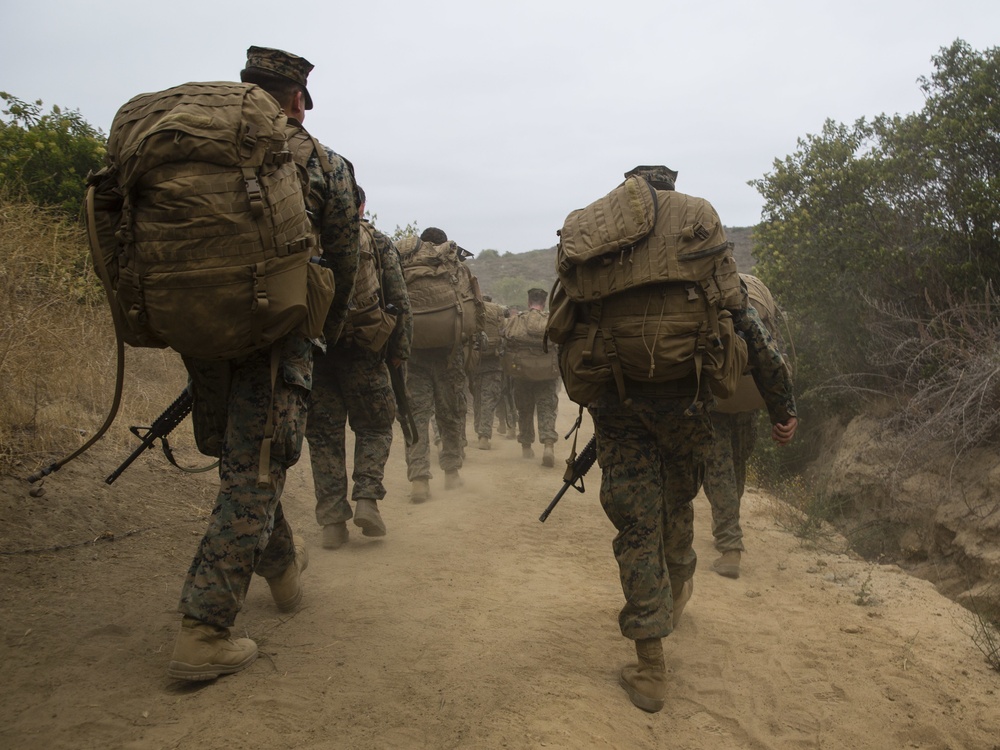 Out the rack, grab your pack: Marines with Headquarters &amp; Support Battalion conduct sustainment hike