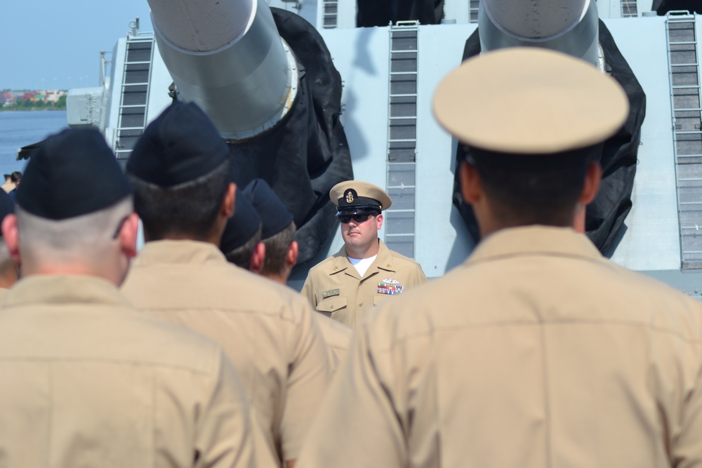 In-front of a Battleship Turret