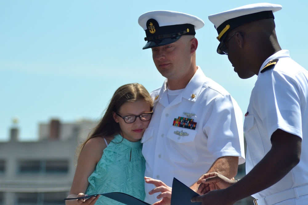 During a re-enlistment ceremony on the USS Wisconsin