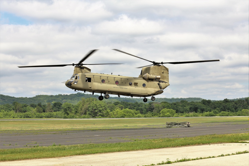 Chinook helicopter, crew supports Fort McCoy sling-load training