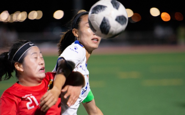 Korea wins 2-0 over China