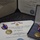 The image shows two Air Medal certificates from the United States of America awarded to members of the United States Coast Guard, along with their corresponding medals. The foreground certificate is awarded to Matthew W. Silvious, Aviation Survival Technician First Class, for meritorious achievement in aerial flight. Two physical Air Medal decorations are visible — one resting on the certificate and one displayed in a presentation box.