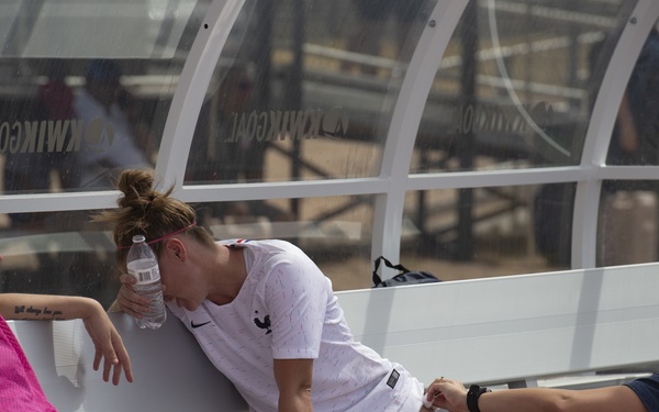 Doctor Tends to a Wound