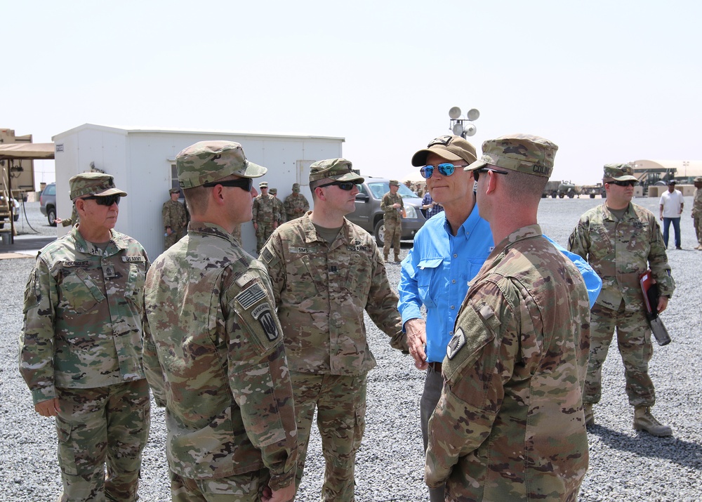 Florida Gov. Rick Scott visits National Guard field artillery soldiers in Kuwait