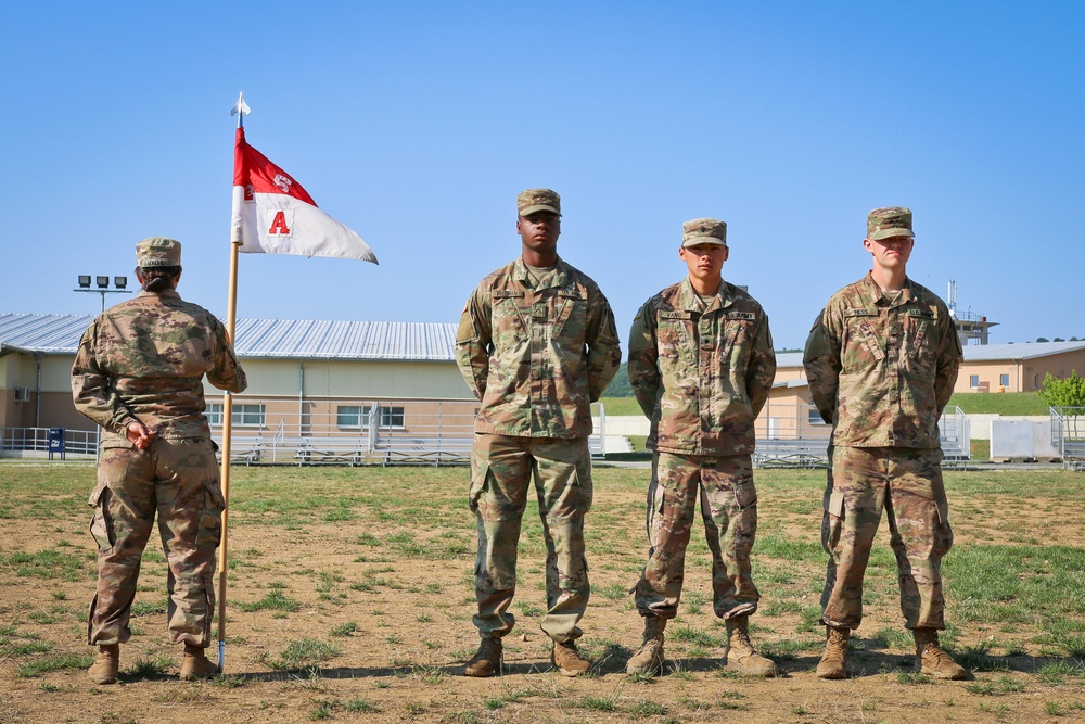 A Co 2-5 soldiers receive CSM coins