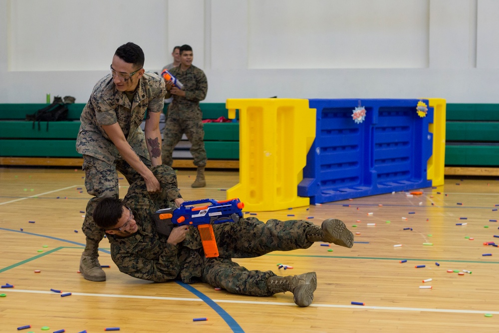 Marines and Sailors with SPMAGTF-CR-AF LCE 18.2 participate in Nerf Gun Battle