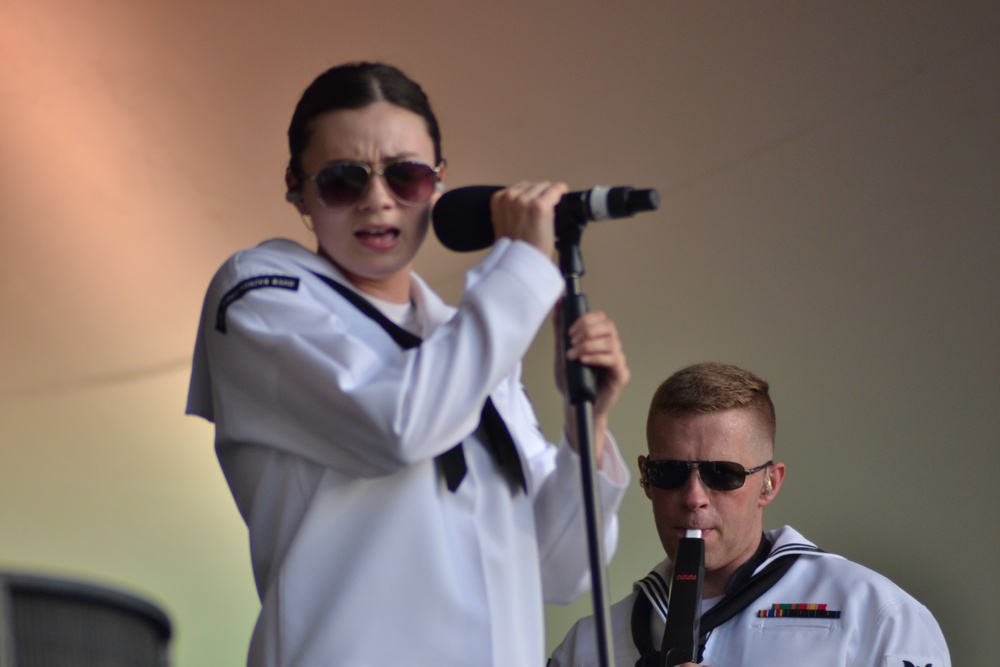 Four Star Edition performs for a festive audience