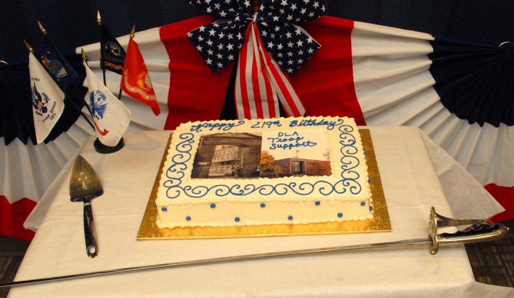 Pictures of the original Schuylkill Arsenal and the current Defense Logistics Agency Troop Support headquarters adorn the cake for the celebration of Troop Support's 219th birthday in Philadelphia June 6.