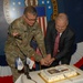 Defense Logistics Agency Troop Support Commander Army Brig. Gen. Mark Simerly (left) and Acquisition Executive William Kenny (right) cut Troop Support's birthday cake in Philadelphia July 6.