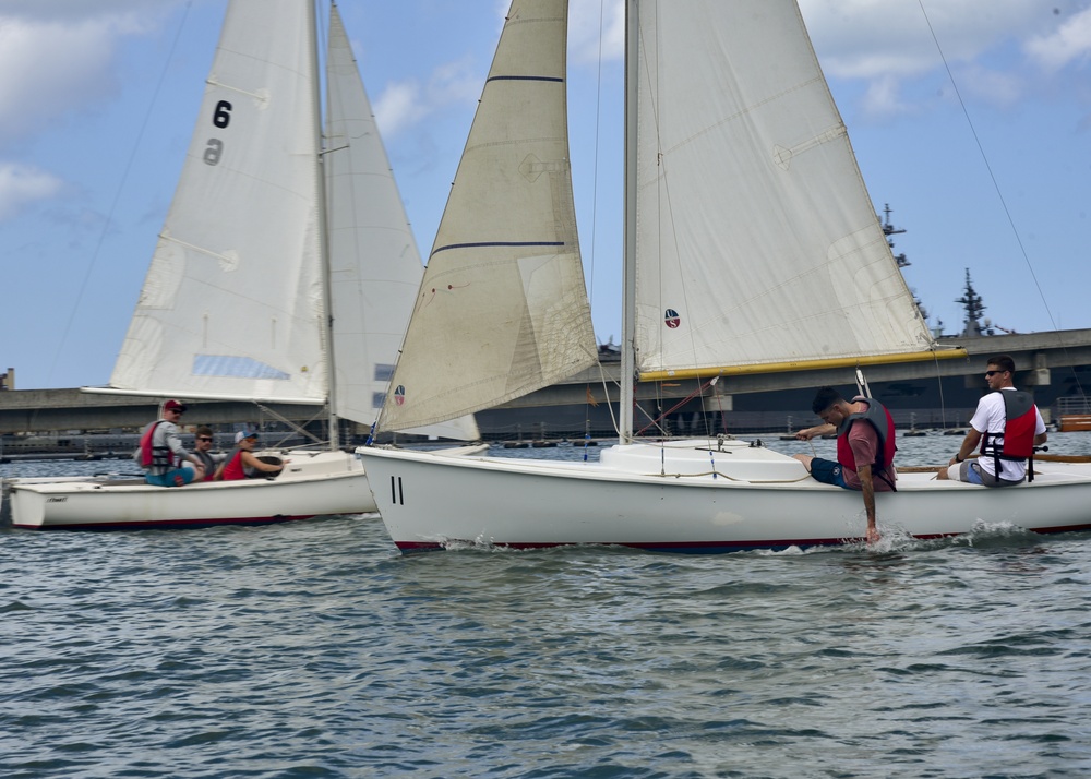 Service Members Sail in Rainbow Bay Marina Regatta