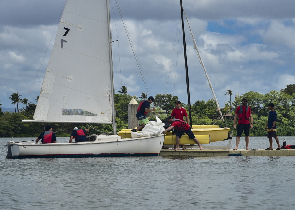 Service Members Sail in Rainbow Bay Marina Regatta