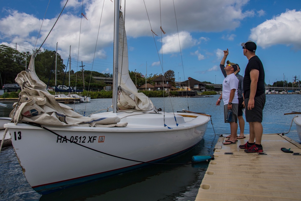 RIMPAC 2018 Participants Compete in a Sailboat Regatta at the Pearl Harbor Yacht Club.