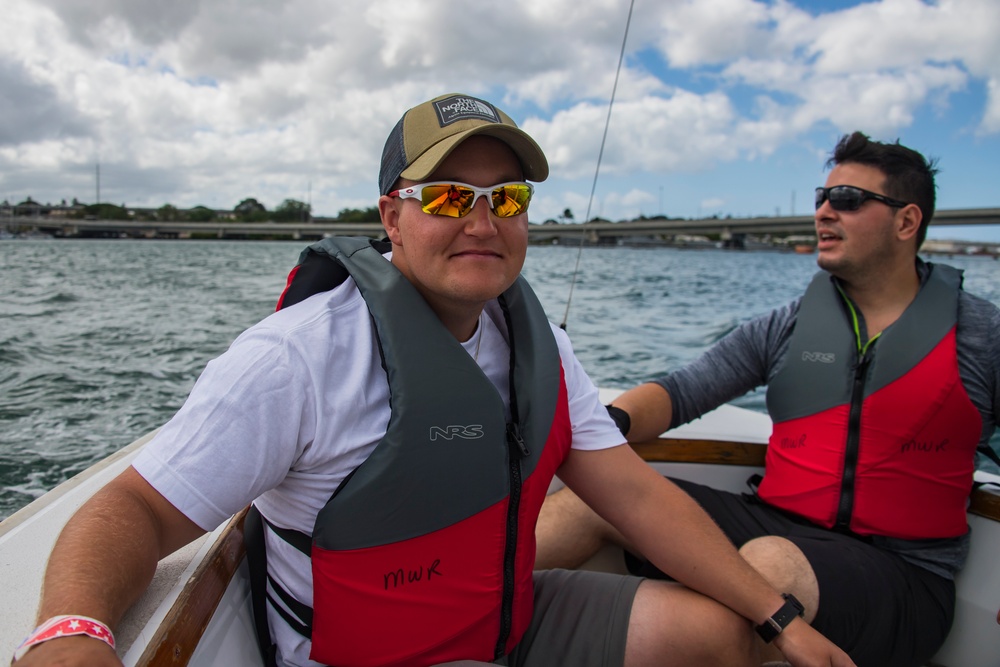 RIMPAC 2018 Participants Compete in a Sailboat Regatta at the Pearl Harbor Yacht Club.