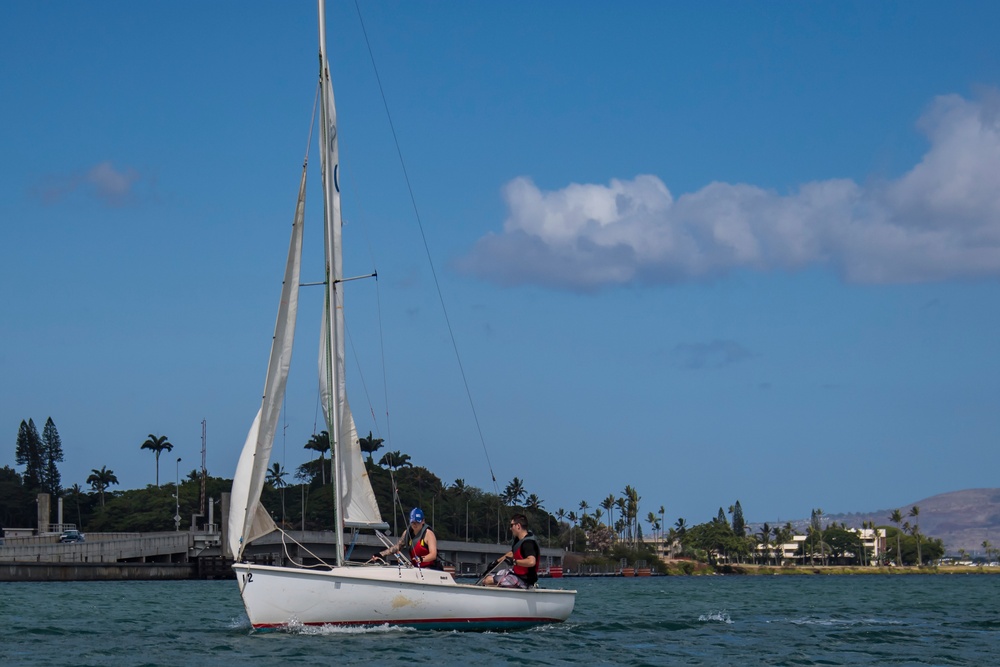 RIMPAC 2018 Participants Compete in a Sailboat Regatta at the Pearl Harbor Yacht Club.