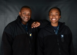 Father and Daughter Pose Together