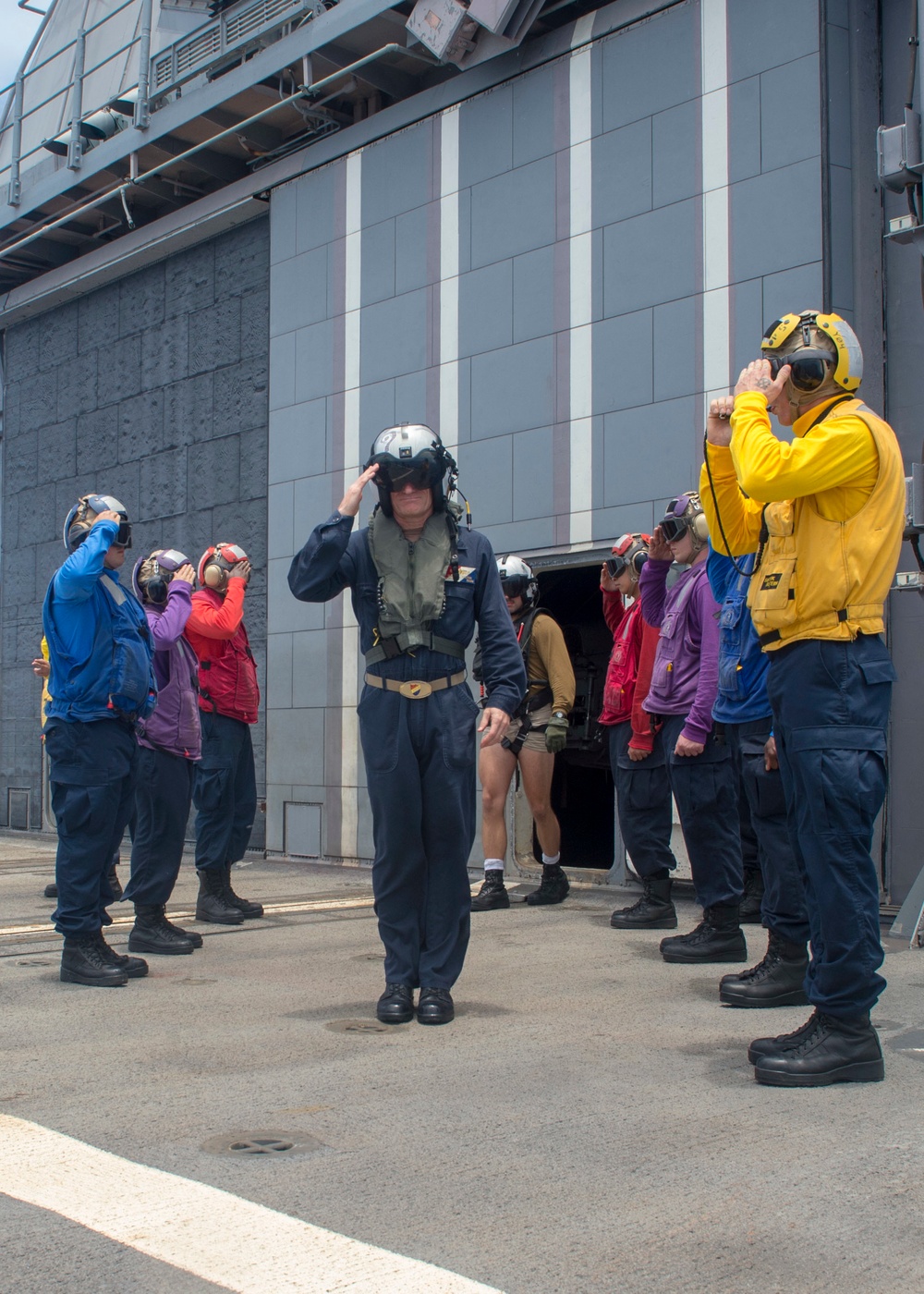 Rear Admiral Marc Dalton is rendered honors on the flight deck of USS Antietam (CG 54)