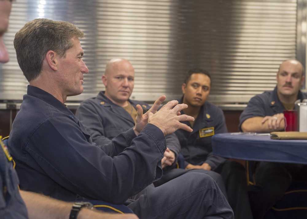 Rear Admiral Marc Dalton speaks with the chief’s mess of USS Antietam (CG 54)