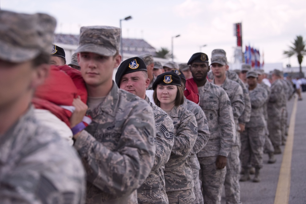 Airmen from 45th Space Wing, service members unfurl flag at Daytona Coke Zero Sugar 400