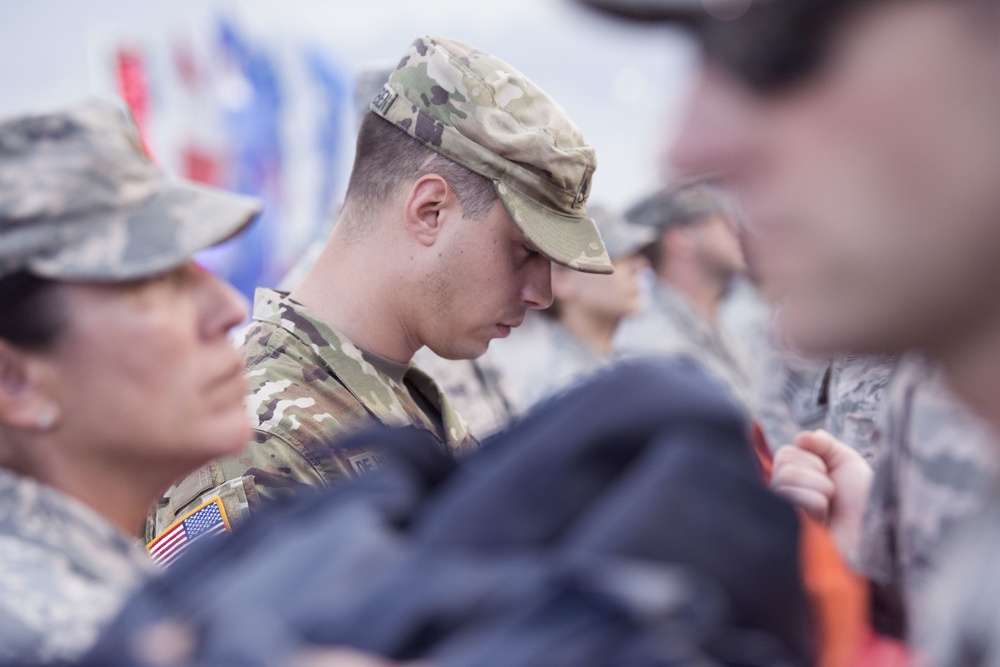 Airmen from 45th Space Wing, service members unfurl flag at Daytona Coke Zero Sugar 400