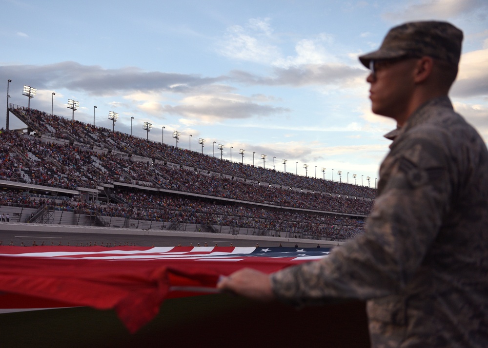 Airmen from 45th Space Wing, service members unfurl flag at Daytona Coke Zero Sugar 400