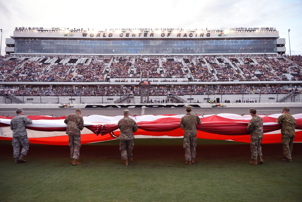 Airmen from 45th Space Wing, service members unfurl flag at Daytona Coke Zero Sugar 400