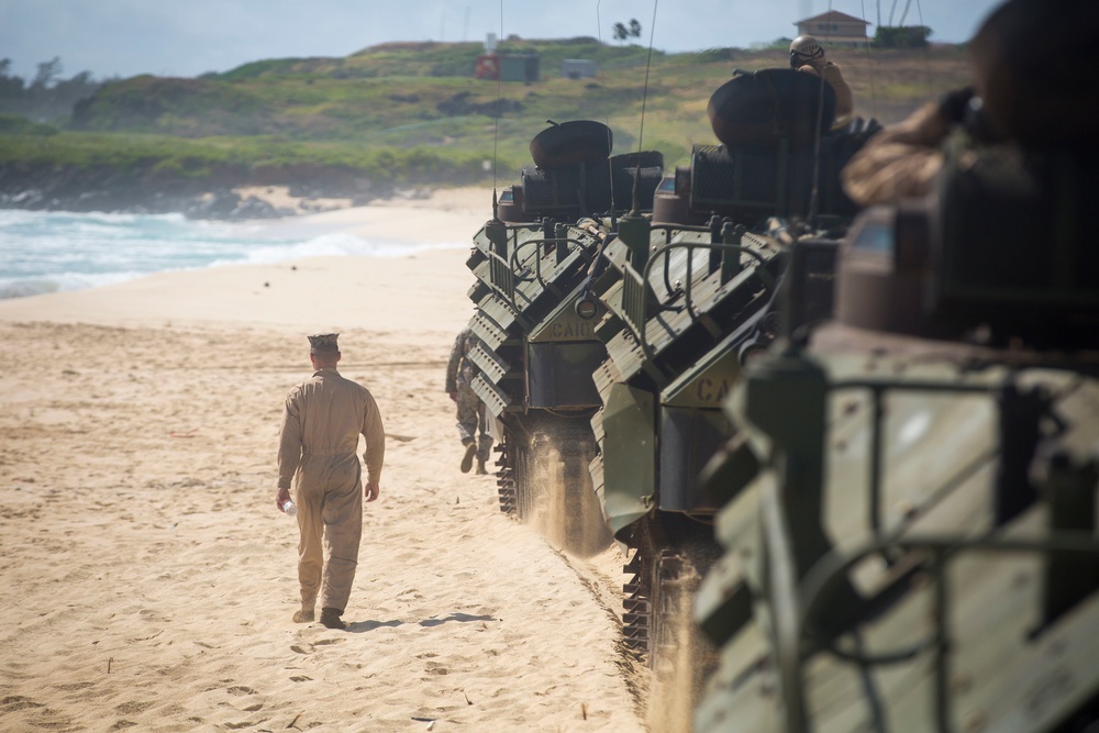 U.S. Marines with AAVs splash into RIMPAC