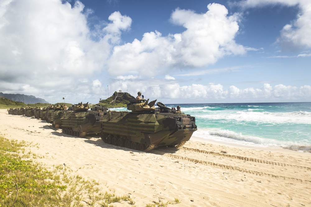 U.S. Marines with AAVs splash into RIMPAC