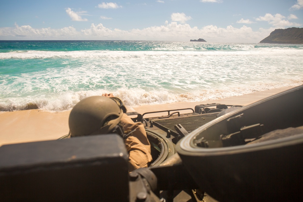 U.S. Marines with AAVs splash in RIMPAC