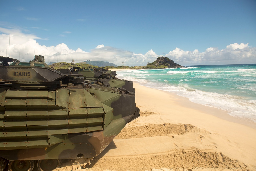 I.S. Marines with AAVs splash into RIMPAC