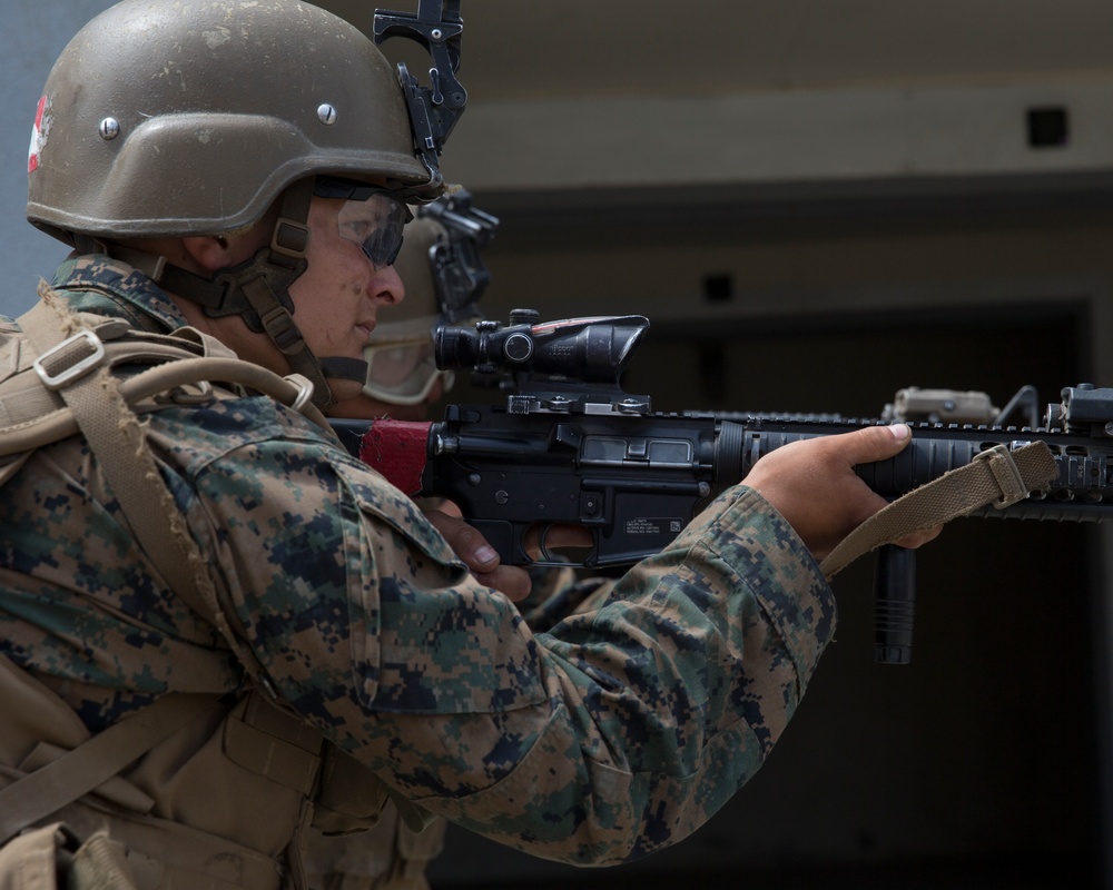 Marine Combat Training students secure their perimeter