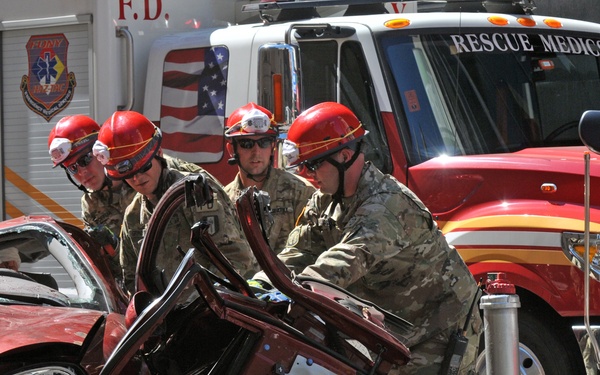 Teaming up to pry off doors