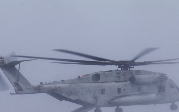 U.S. Marines, Canadian Soldiers helocast together during RIMPAC