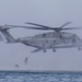 U.S. Marines, Canadian Soldiers helocast together during RIMPAC