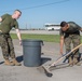 Marines cleaning parking lot at JBSA-Lackland