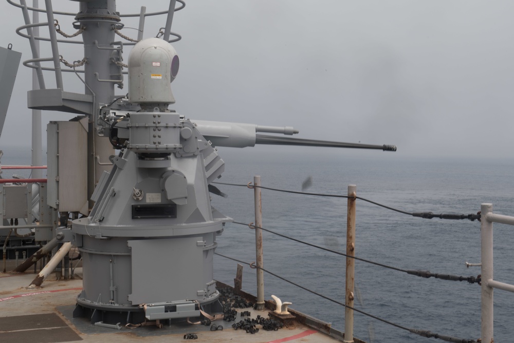 USS Harpers Ferry conducts gun exercise