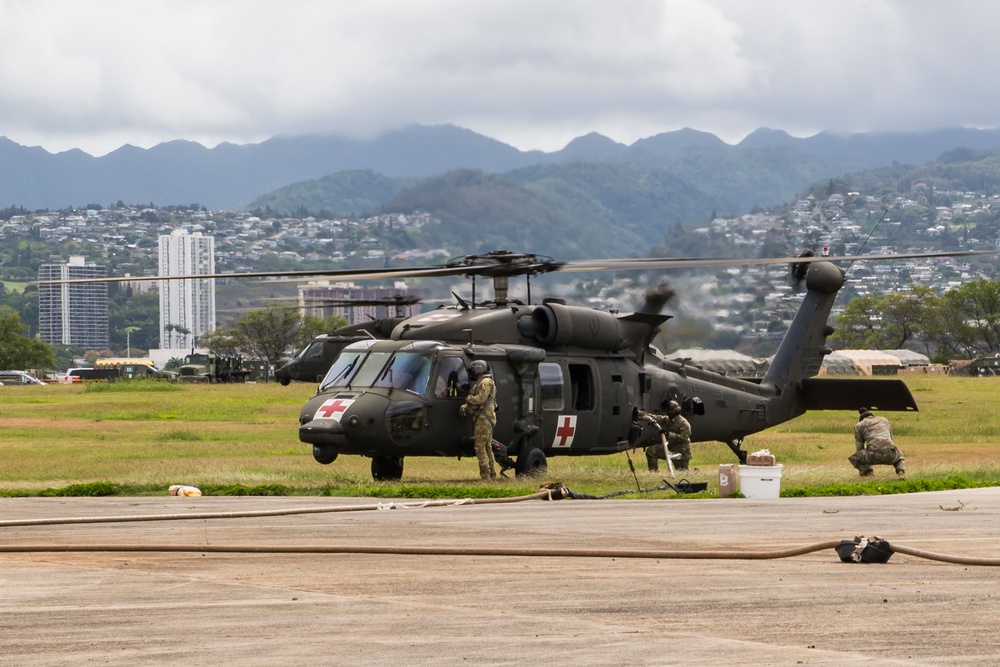 UH-60 Black Hawks Conduct Helicopter Rapid Refueling During RIMPAC 2018 Exercise