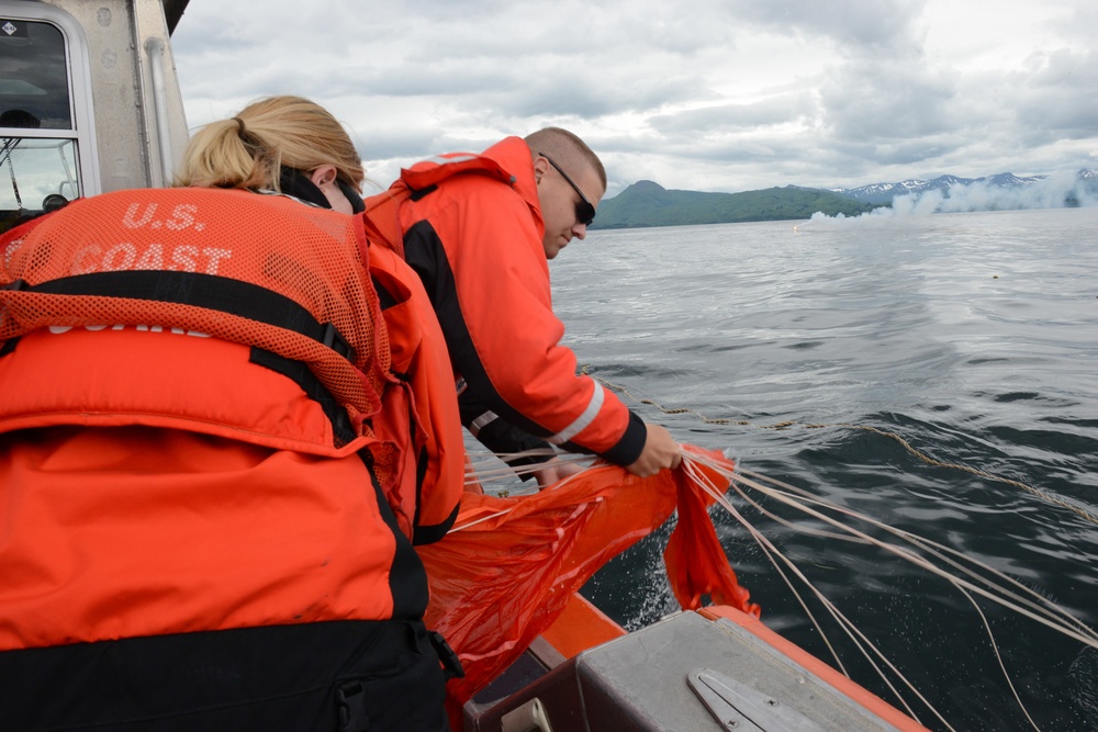 Coast Guard ANT Team conducts drop training with Air Station HC-130 Hercules aircrew