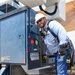 A 502nd Civil Engineer squadron high voltage team re-attaches the cover over Medina Base Gate