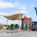 A 502nd Civil Engineer squadron high voltage team re-attaches the cover over Medina Base Gate