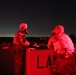 Task Force Ultimate range safety officers engage targets at night