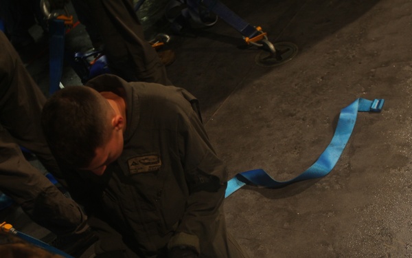 U.S. Marines embark onto the HMAS Adelaide during RIMPAC