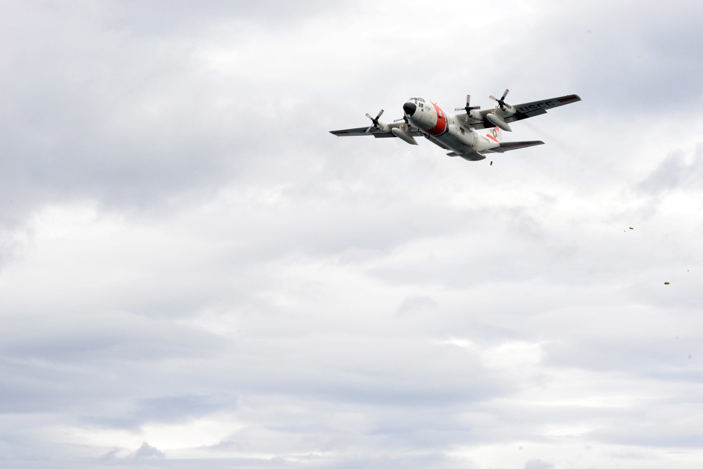 Coast Guard HC-130 Hercules conducts drop training with ANT Team