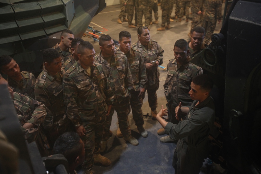 Tongan Marines get familiar with AAVs aboard HMAS Adelaide during RIMPAC