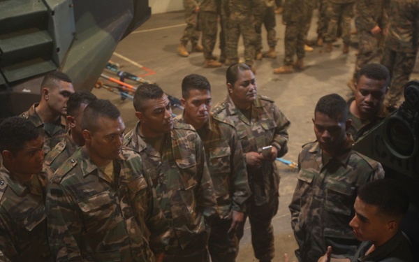 Tongan Marines get familiar with AAVs aboard HMAS Adelaide during RIMPAC