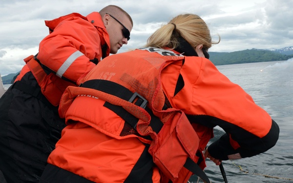 Coast Guard ANT Team conducts drop training with Air Station HC-130 Hercules aircrew