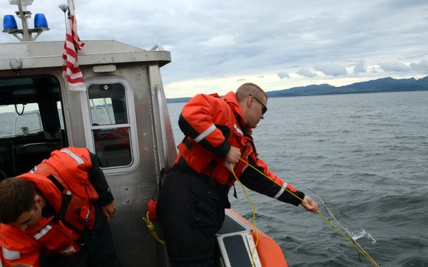 Coast Guard ANT Team conducts drop training with Air Station HC-130 Hercules aircrew