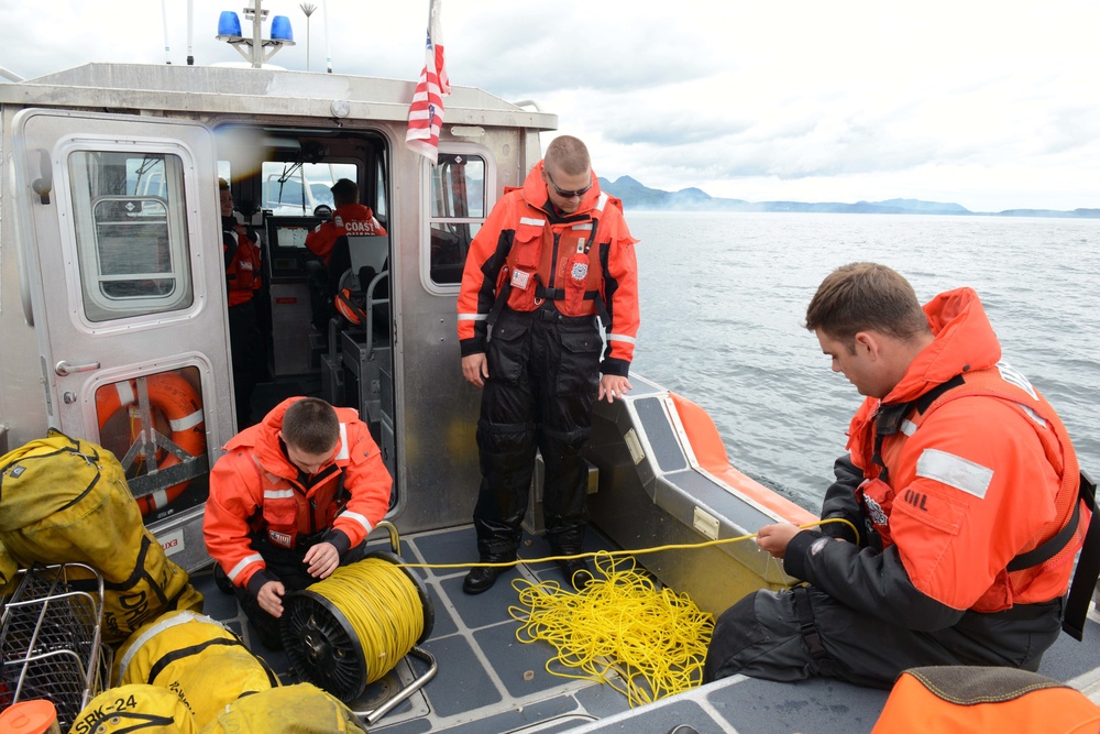 Coast Guard ANT Team conducts drop training with HC-130 Hercules aircrew