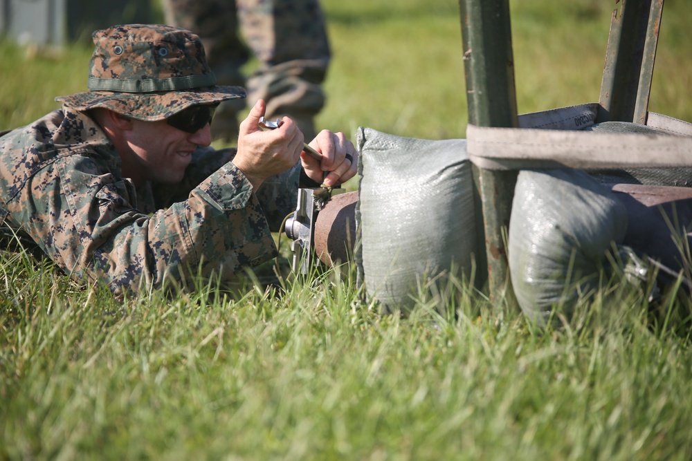 Sgt. Derek Ford fastens a piece of equipment in place during a tool range aboard MCAS Beaufort July 11. Ford is an Explosive Ordnance Disposal Marine with Marine Wing Support Detachment 31.